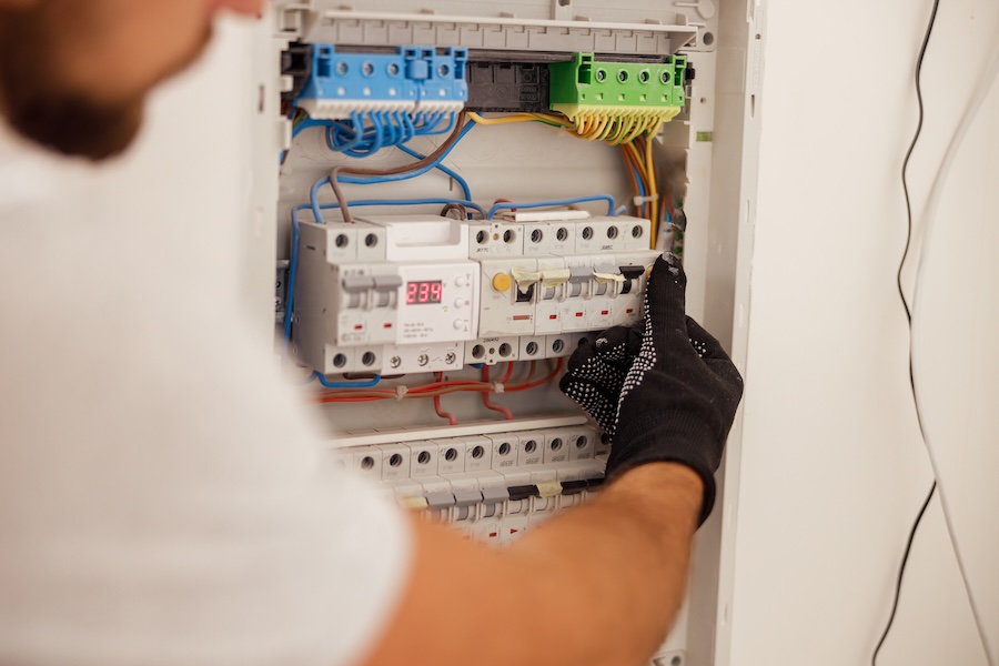 electrician working on electrical box wires and 2026 01 08 07 47 48 utc
