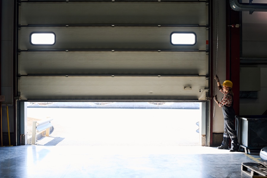 young female worker of factory or hangar opening s 2026 03 20 00 22 23 utc